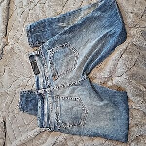 Buckle black hemmed jeans